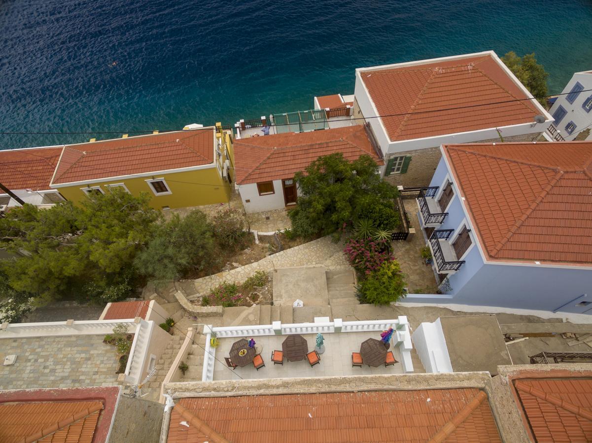 Roulas Apartments Chalki Town Exterior photo